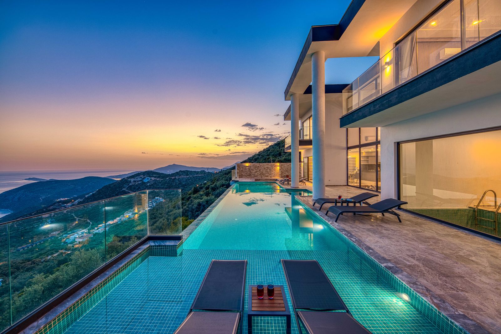 Villa with pool at sunset